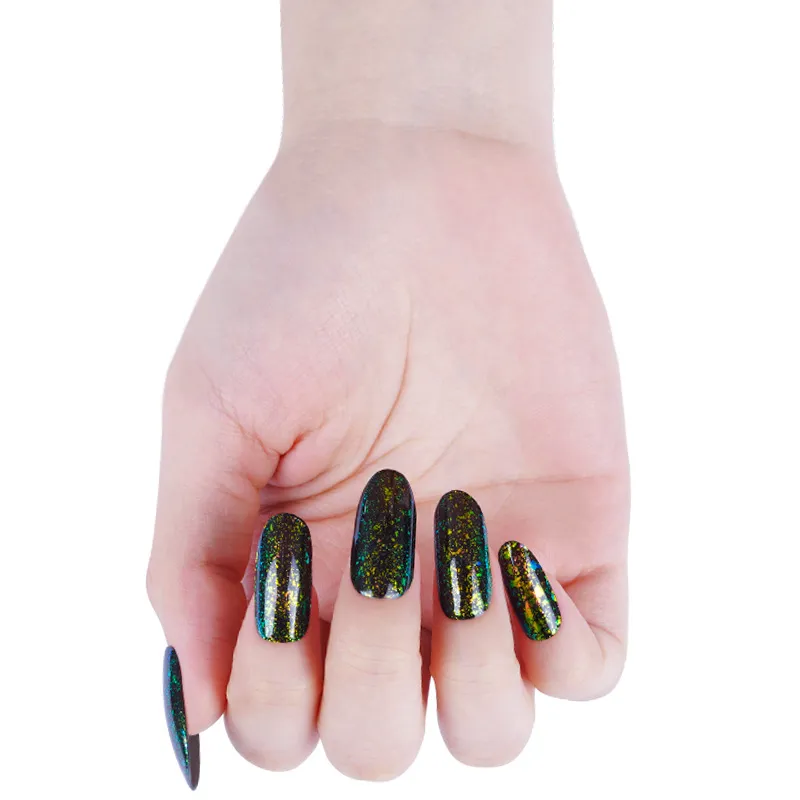 Dark green-gold glitter nails on white background