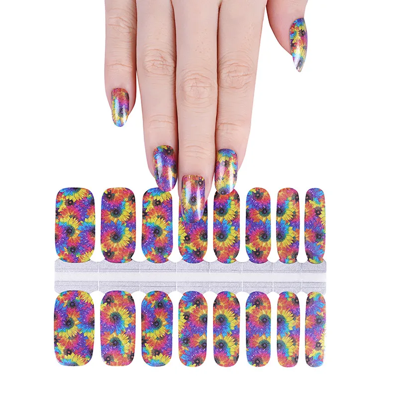 Hand with floral nail wraps and matching designs below