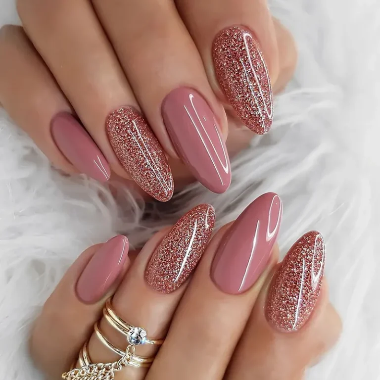 Pink glitter nails with rose-gold accents on white fur